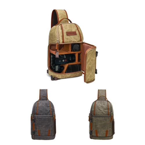 A waxed canvas camera sling bag in sand and grey, featuring padded compartments for camera equipment and a logo.