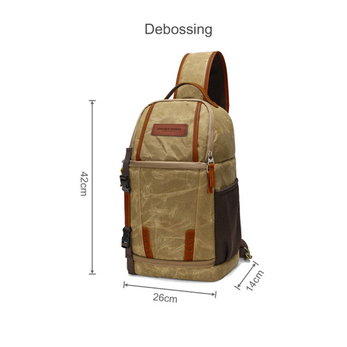 A waxed canvas camera sling bag in tan with brown and black accents, featuring various compartments and a logo.