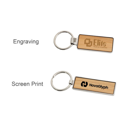 A rectangular wooden keyring featuring a silver metal keychain, showcasing engraving and screen print designs.