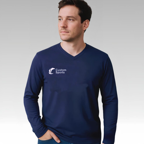 A man in a navy V-neck long sleeve shirt with a logo on the front.
