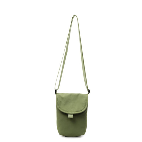 A small size canvas shoulder bag in a muted green colour with an adjustable strap and a flap closure.