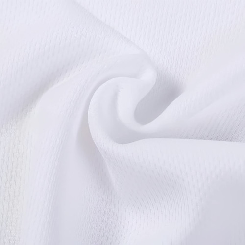 A close-up of white poly micro mesh fabric, showcasing its texture and lightweight feel. The material has a subtle pattern.