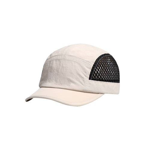 A short brimmed mesh running cap in cream and black, featuring a mesh panel and a rounded brim.