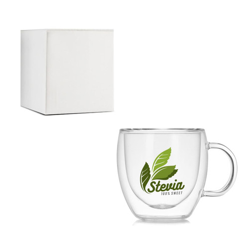 A clear glass double wall mug with a handle, accompanied by a plain white box. The mug features a green logo.
