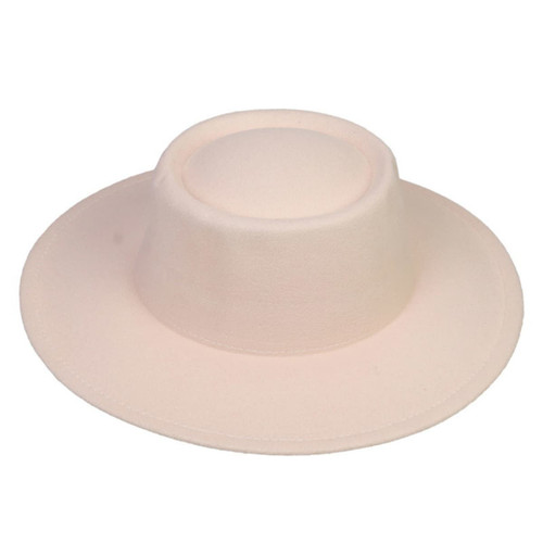 A flat top felt fedora hat in a soft cream colour with a wide brim and a rounded crown. It features a logo.