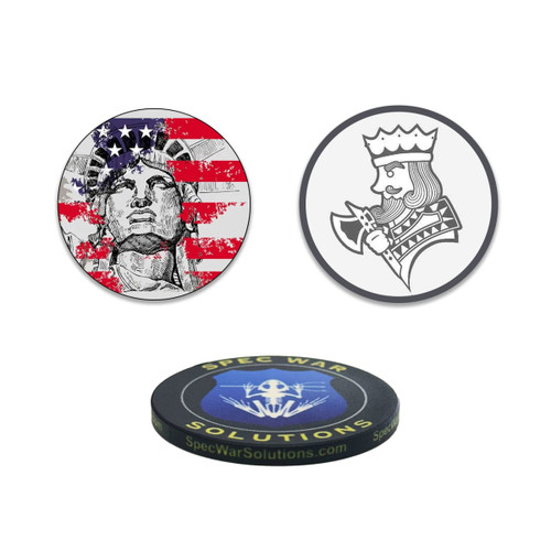 Three custom poker chips featuring designs: one with the Statue of Liberty, one with a king’s profile, and a third with a logo. The chips have black and multicoloured elements.
