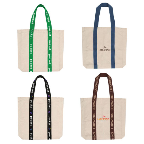 A collection of four custom woven handle tote bags in beige with blue, green, brown, and dark brown straps, featuring logos.