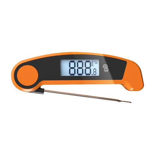 An orange digital instant read meat thermometer with a large display showing temperature readings.
