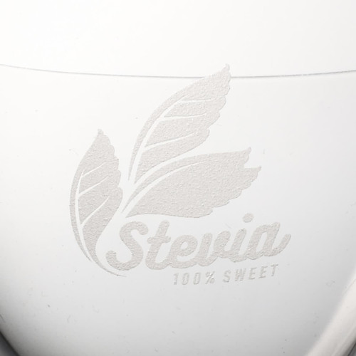 A white container with a textured leaf design and the word "Stevia" embossed on it.
