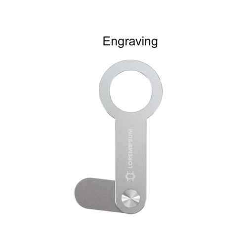 A silver aluminium magnetic phone holder for a laptop with a circular holder and an engraving section.