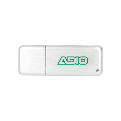 A silver flash drive with a logo, featuring a sleek design and a smooth surface.
