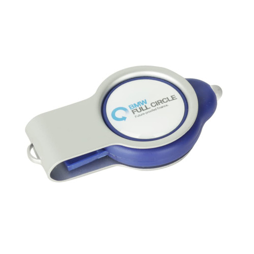 A blue and silver retractable flash drive with a round logo on the top.