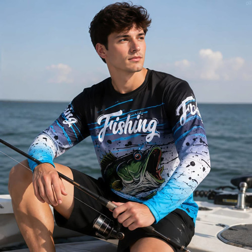 A long-sleeved fishing shirt in blue and black, featuring a graphic design with a fish and logo.