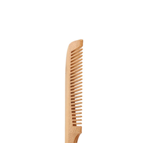 A natural bamboo comb with a handle, featuring alternating wide and narrow teeth, in a light brown colour.