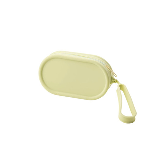 A round, pale yellow silicone storage bag with a zipper and a convenient carrying strap.