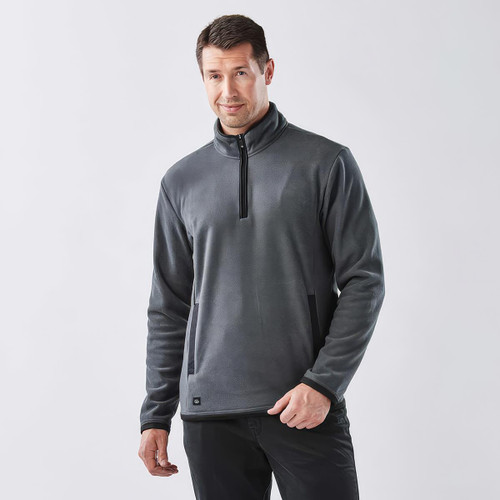 A dark grey men's fleece jumper featuring a quarter zip and a logo on the front.