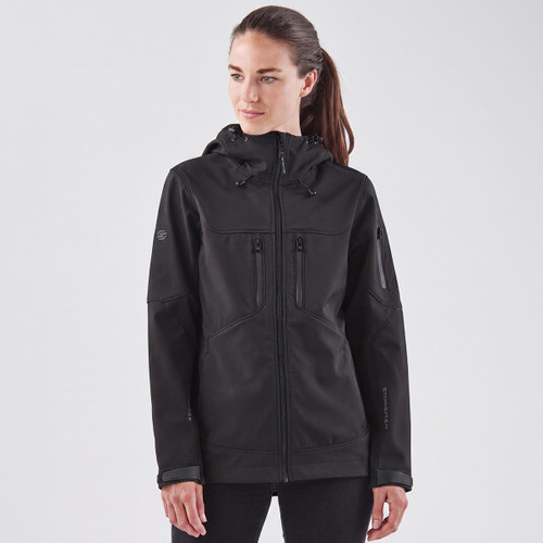 A black softshell jacket with a hood, featuring multiple zippered pockets and a logo.