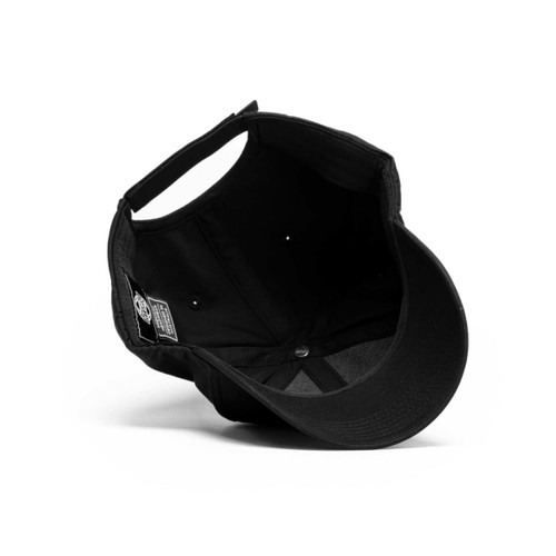 A black cap with a curved brim, featuring an interior view that highlights its design and stitching.