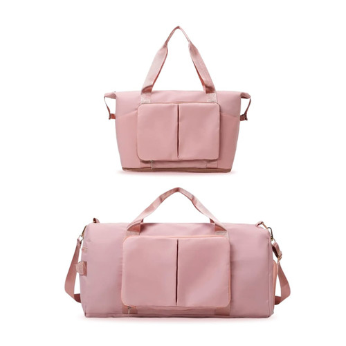 A foldable sports duffle bag in pink featuring double handles, a detachable shoulder strap, and front pockets.