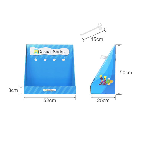 A blue corrugated cardboard display stand with hooks for casual socks, featuring a slanted design and various colours.