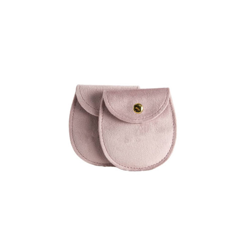 Two oval-shaped velvet jewellery pouches in a soft pink hue, featuring a snap closure and a subtle logo.