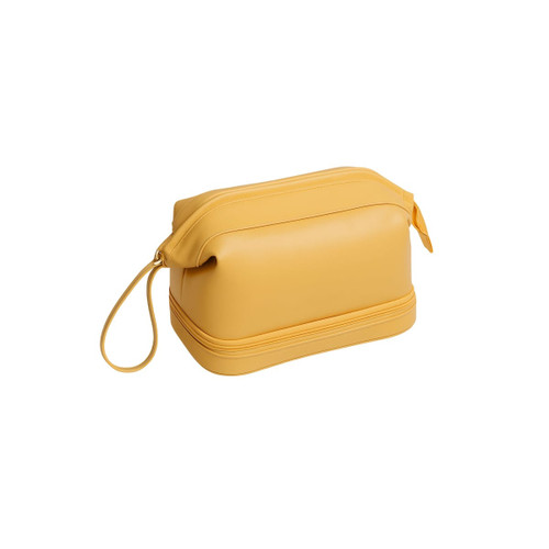 A large capacity toiletry bag in bright yellow with a smooth finish and a zippered top. Contains a handle for easy carrying.
