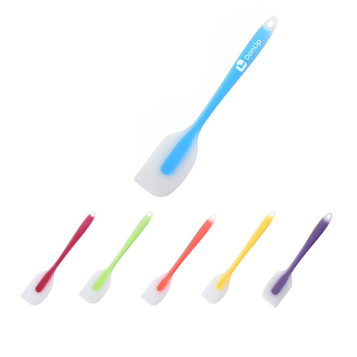 A silicone spatula in various colours including purple, orange, green, pink, and yellow, with a logo on one.