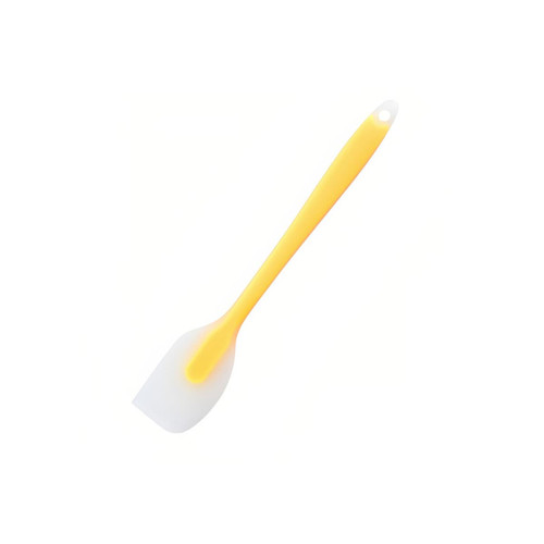 A silicone spatula with a yellow handle and a white spatula head. It features a hole for hanging.