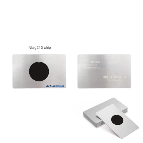 A stainless steel business card with a black NFC chip, featuring a logo and personal details on one side.