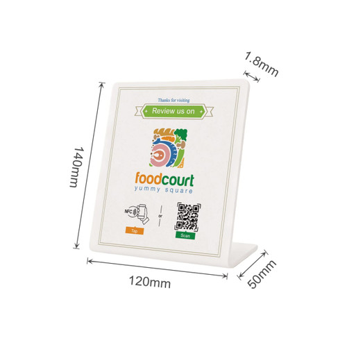 A white NFC review stand with dimensions, featuring a logo and a QR code design.