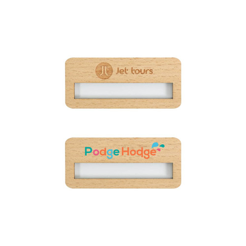 A reusable wooden name badge in light wood with a clear window for name display and a logo at the top.
