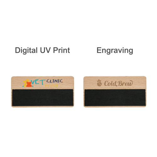A wooden chalkboard name badge with a black writing surface and engraved sections, featuring a logo on one side.