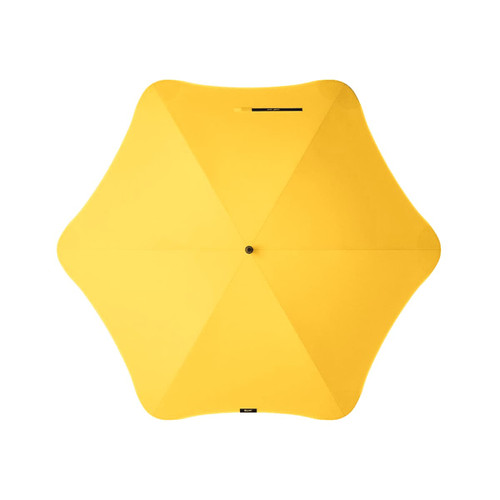 A yellow umbrella with a unique star shape, featuring a central button and a logo.
