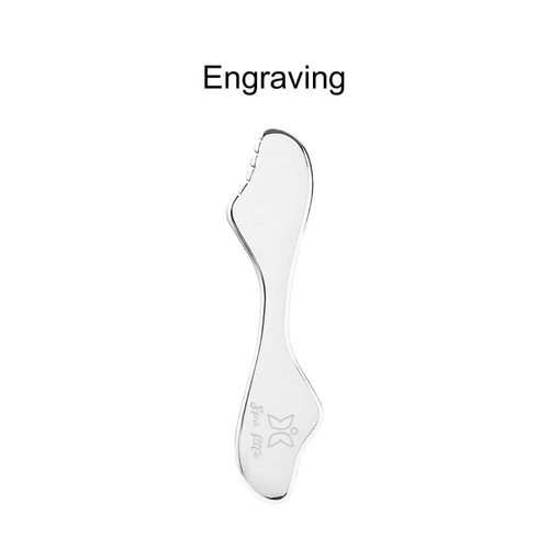 A sleek, silver massage tool with a curved shape, featuring a logo and a textured edge.