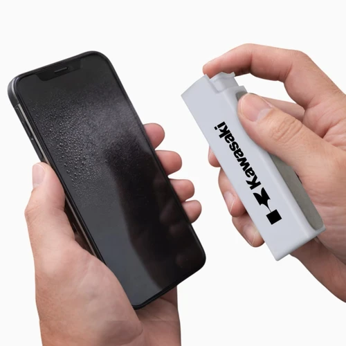 A phone cleaning device in grey next to a wet smartphone screen, featuring a logo. 