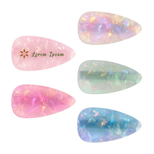 A set of teardrop-shaped iridescent alligator hair clips in pink, green, and blue colours, featuring a logo.