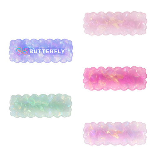 A collection of five wavy rectangle hair clips in pastel colours: purple, pink, and green, featuring iridescent hues.