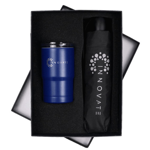 A drink bottle and a black umbrella in a black gift box, featuring a logo on both items. The tumbler is blue.