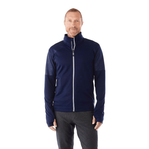 A men's navy performance jacket featuring a full zip and thumb holes, with an attached logo.