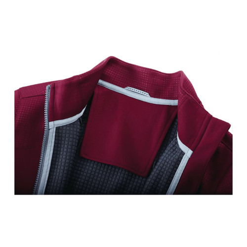 A maroon women's jacket featuring a full zip and thumb holes, with a textured interior lining and a logo.