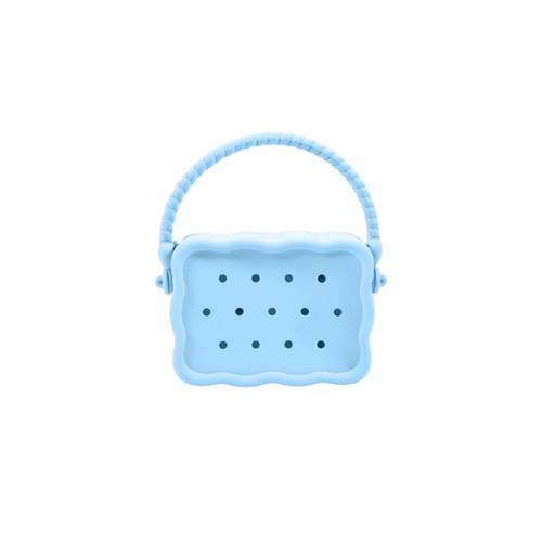 A light blue silicone bag with a textured surface and holes, featuring a braided handle.