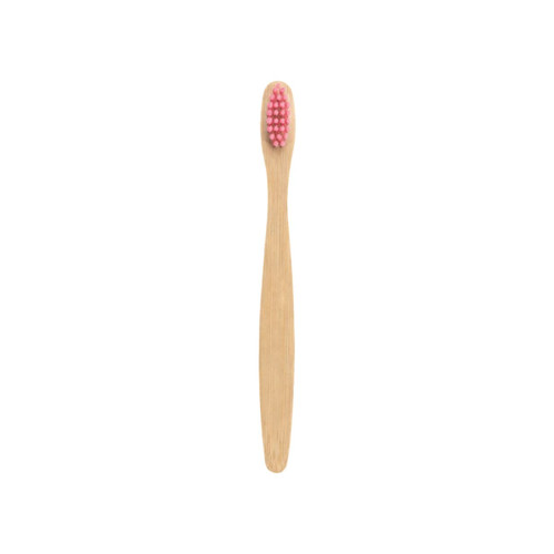 A small bamboo toothbrush with a pink bristle head and a smooth bamboo handle. It has a simple logo on the base.