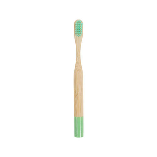 A bamboo toothbrush with a small round handle featuring a mint green bottom and soft bristles.