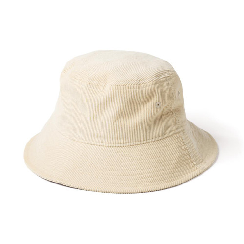 A beige corduroy bucket hat with a round crown and wide brim, featuring a logo.