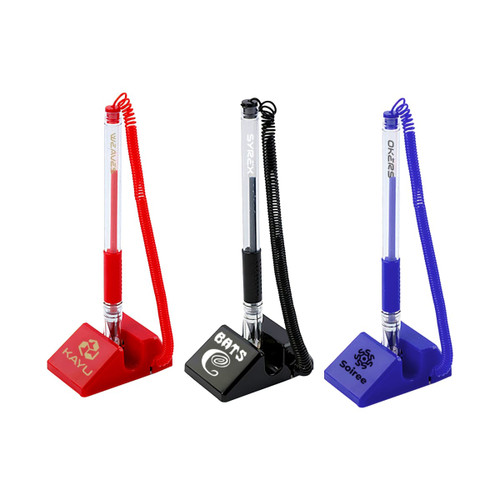 A counter fixed signature pen set featuring red, black, and blue pens attached to bases with branding logos.