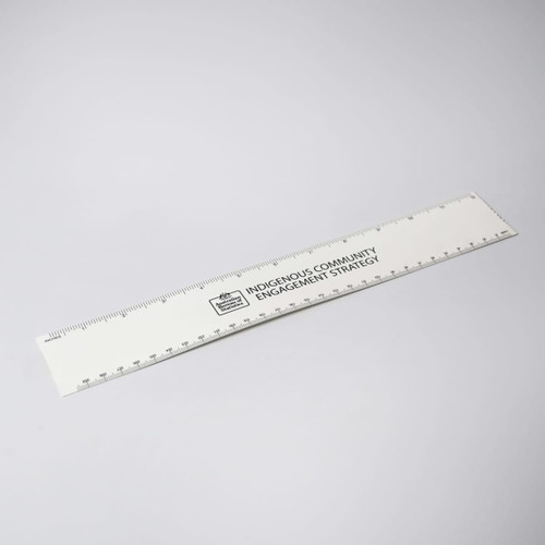 A white ruler with markings and a logo, designed for office and business use.