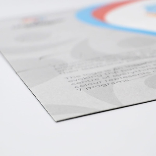 A magnetic jigsaw puzzle, featuring a colourful design with blue, red, and grey elements, showcasing a logo.