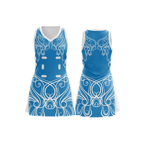 A women's A-line netball dress in blue featuring white decorative patterns and a logo.