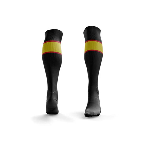 A pair of black soccer socks featuring a yellow stripe and red accents. The socks have a logo on them.