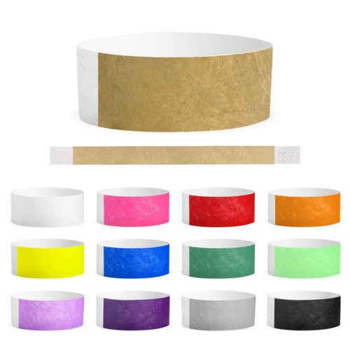 A collection of Tyvek adult wristbands in various colours, including white, pink, red, green, and more, with a textured finish.